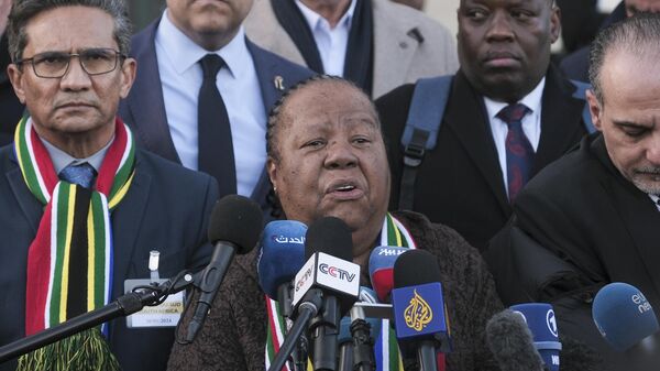 South Africa's Foreign Minister Naledi Pandor, centre, addresses reporters after session of the International Court of Justice, or World Court, in The Hague, Netherlands, Friday, Jan. 26, 2024.  - Sputnik Africa