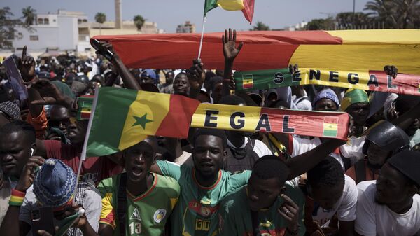 People shout slogans during a protest against the possibility of President Macky Sall to run for a third term in the presidential elections next year in Dakar, Senegal, Friday, May 12, 2023.  - Sputnik Africa