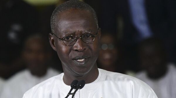 Senegalese Prime Minister Mahammed Buon Abdallah Dionne announces the re-election of President Macky Sal on February 25, 2019 in Dakar.  - Sputnik Afrique