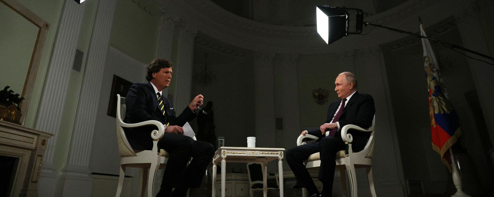 Russian President Vladimir Putin listens to a question during an interview with US journalist Tucker Carlson at the Kremlin in Moscow, Russia. - Sputnik Africa, 1920, 10.02.2024