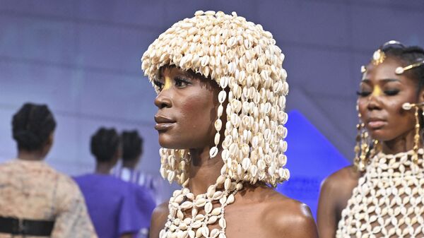 A model presents a creation from Ivorian stylist Lafalaise Dion as part a Fashion show during the Africa Cup of Nations (CAN) 2024 football tournament in Abidjan on February 9, 2024.  - Sputnik Africa