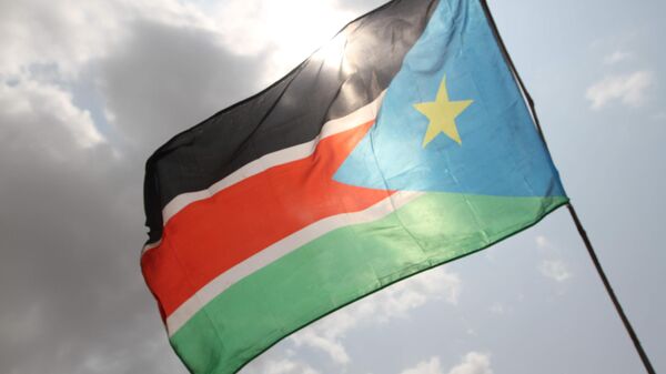 A South Sudanese flag is waving at at the John Garang Mausoleum in the city of Juba during the celebrations of independence. - Sputnik Africa