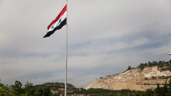 Syrian flag over the capital, Damascus, Syria - Sputnik Africa