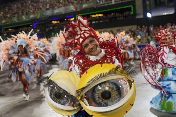 Performers from the Vila Isabel samba school parade during Carnival celebrations at the Sambadrome in Rio de Janeiro, Brazil, early Tuesday, Feb. 13, 2024. - Sputnik Africa