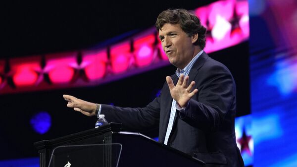 Tucker Carlson speaks at the Turning Point Action conference, Saturday, July 15, 2023, in West Palm Beach, Fla. Carlson, the ousted Fox News host, announced Monday, Dec. 11, that he is starting his own streaming service, promising to “tell the unadorned truth” to fans for $72 a year.  - Sputnik Afrique