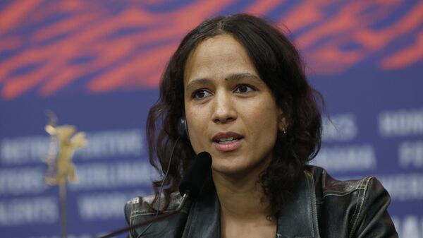 French-Senegalese filmmaker and actress Mati Diop speaks during a press conference for the film Dahomey presented in competition of the 74th Berlinale, Europe's first major film festival of the year, on February 18, 2024 in Berlin. - Sputnik Africa