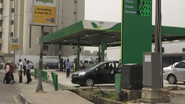 a Gas station displays the price for fuel at a petrol station in Lagos, Nigeria - Sputnik Africa