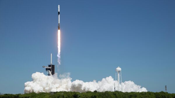 In this image provided by NASA, a SpaceX Falcon 9 rocket, with the Crew Dragon capsule attached, lifts off with the first private crew from Launch Complex 39A Friday, April 8, 2022, at the Kennedy Space Center in Cape Canaveral, Fla. - Sputnik Africa