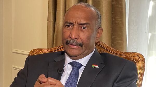 Sudan's General Abdel-Fattah Burhan answers questions during an interview, on Sept. 22, 2022, in New York. Sudan’s top miliary officer is traveling to Egypt on Tuesday, Aug. 29, 2023 - Sputnik Africa