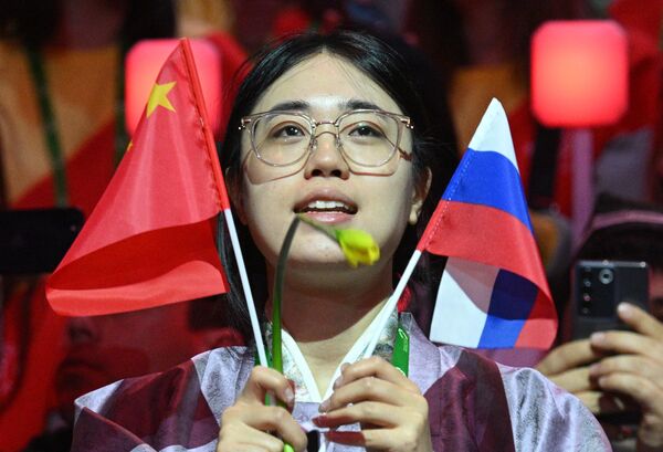 A participant from China at the closing ceremony of the World Youth Festival. - Sputnik Africa