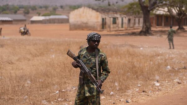 A Nigerian Soldier patrol sat the LEA Primary and Secondary School Kuriga where students were kidnapped in Kuriga, Kaduna Nigeria - Sputnik Africa