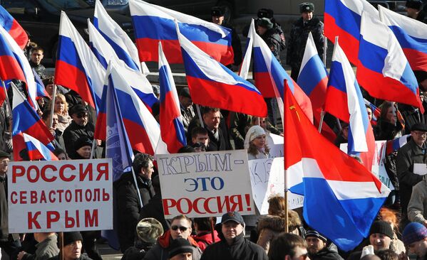 Participants in a rally in the Russian city of Vladivostok in support of the results of the referendum in Crimea. - Sputnik Africa