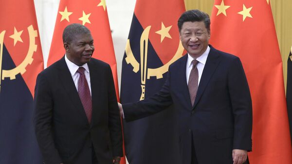 Angola's President Joao Lourenco, left, and Chinese President Xi Jinping prepare for their bilateral meeting at the Great Hall of the People in Beijing, Sunday, Sept. 2, 2018 - Sputnik Africa