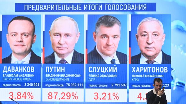 Screens at the information center of Russia's Central Election Commission with the preliminary results of the presidential election, seen in Moscow, Russia, Monday, March 18, 2024. - Sputnik Africa