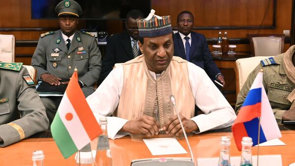 Niger's rebel-appointed Prime Minister Ali Mahaman Lamine Zeine attends a meeting with Russian Deputy Prime Minister Alexei Overchuk in Moscow, Russia, on January 16, 2024. - Sputnik Africa