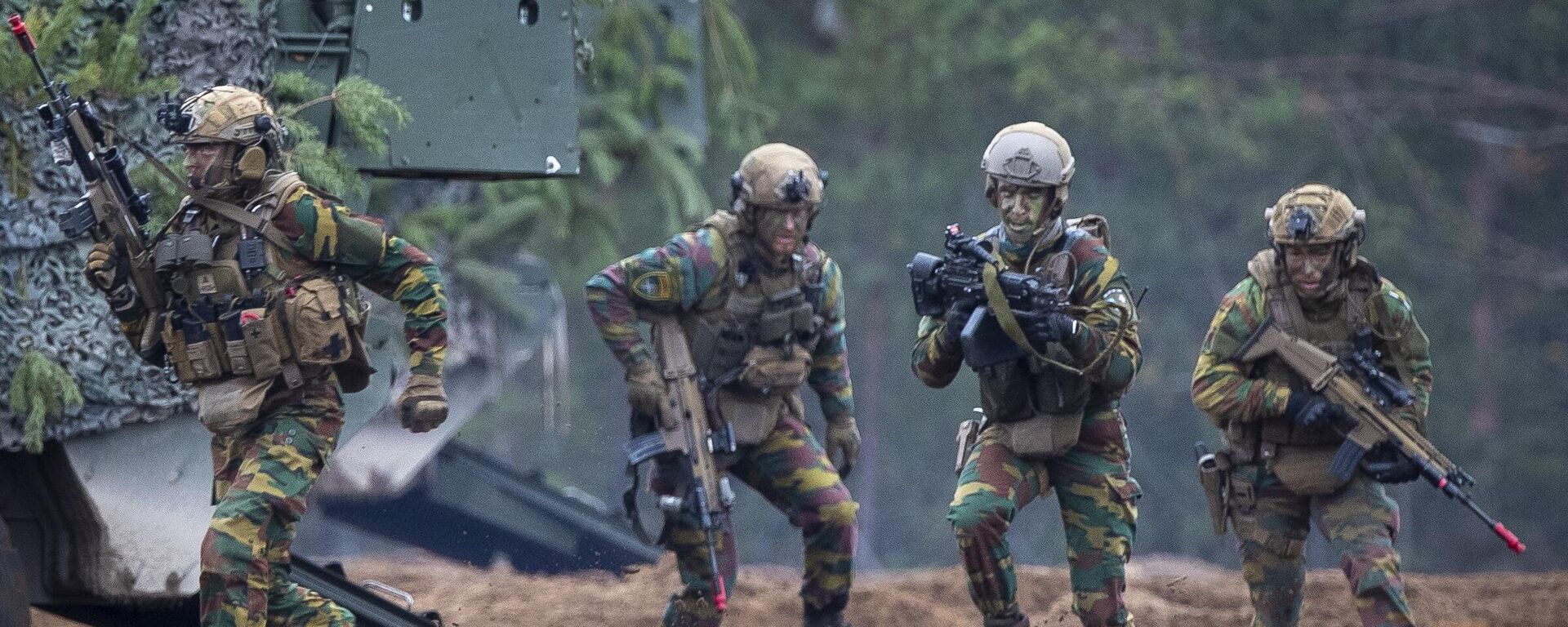 Soldiers take part in the NATO military exercise 'Iron Wolf 2022-II' at a training range in Pabrade, north of the capital Vilnius, Lithuania on Wednesday, Oct. 26, 2022. - Sputnik Africa, 1920, 04.04.2024