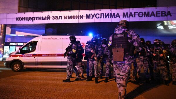 Russian security services deployed around the Crocus City Hall concert venue following Friday's deadly terrorist incident. - Sputnik Africa