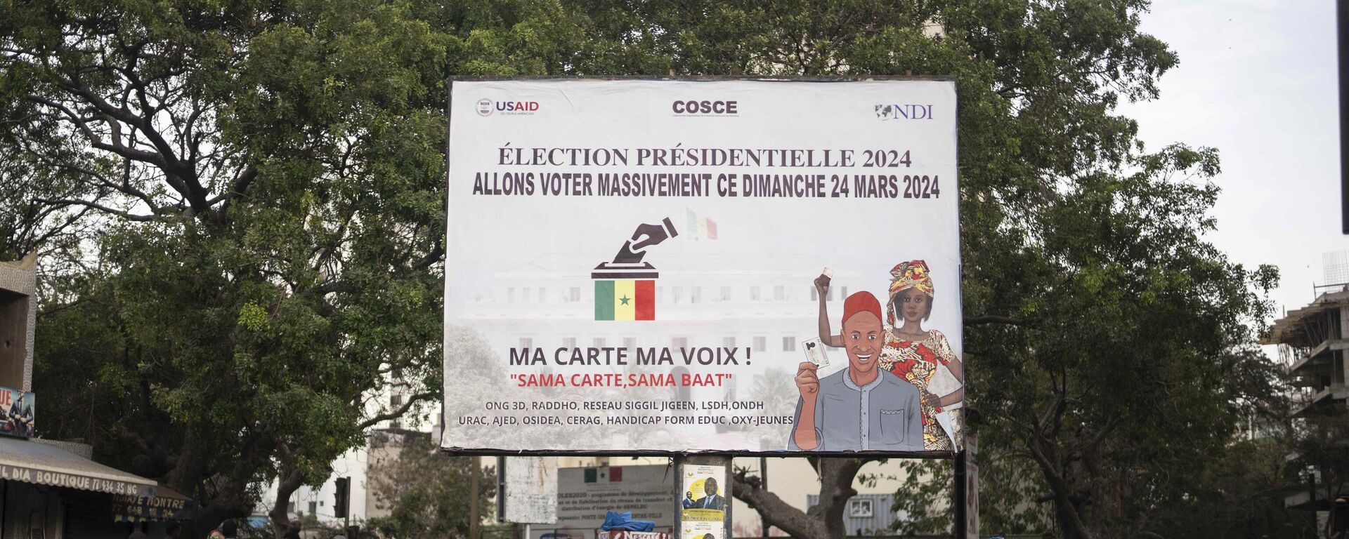 A banner encouraging people to vote in the upcoming presidential elections is displayed in Dakar, Senegal, Wednesday, March 20, 2024.  - Sputnik Africa, 1920, 24.03.2024