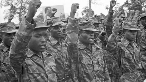 Fighters of the People's Movement for the Liberation of Angola speak at a rally of the President of the People's Republic of Angola, Jose Eduardo dos Santos. - Sputnik Africa