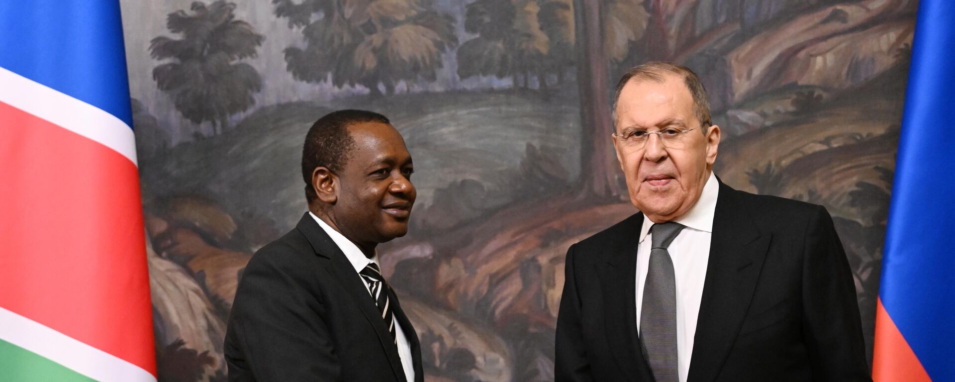 Russian Foreign Minister Sergey Lavrov and Namibian Minister of International Relations, Peya Mushelenga, left, shake hands during a joint press conference following their meeting at the Russian Foreign Ministry's Reception House, in Moscow, Russia, on Tuesday, March 26, 2024. - Sputnik Africa, 1920, 26.03.2024