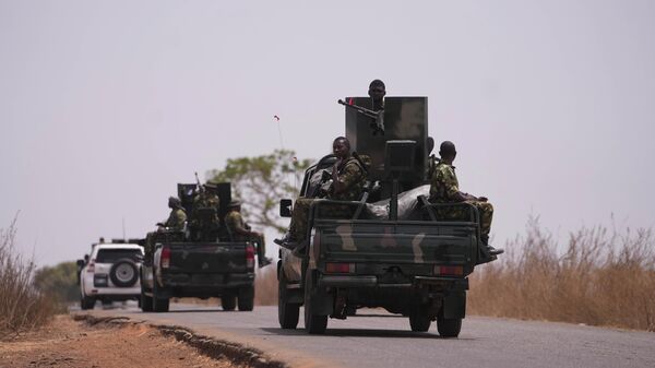 Nigerian army patrol near LEA Primary and Secondary School Kuriga where students were kidnapped in Kuriga, Kaduna, Nigeria, Saturday, March 9, 2024.  - Sputnik Afrique