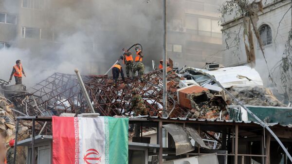 Un incendie s'est déclaré après les frappes ayant touché un bâtiment annexé à l'ambassade iranienne à Damas, en Syrie, le 1er avril 2024 - Sputnik Afrique