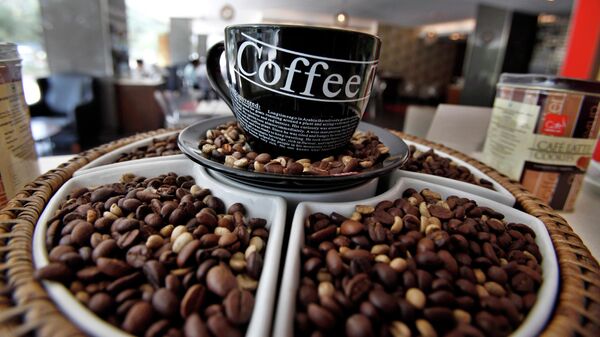 Coffee beans are displayed at a premium Cafe Coffee Day outlet in Bangalore, India, Tuesday, Jan. 31, 2012. - Sputnik Africa