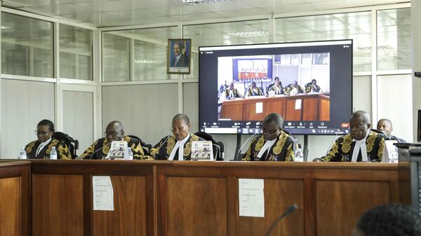The panel of five judges of the Constitutional Court led by the country's chief justice, Richard Buteera, in Kampala, Uganda, Wednesday, April 3, 2024, gives its seal of approval on the anti-homosexuality law, declaring that the Anti Homosexuality Act of 2023 complies with the Constitution of Uganda. - Sputnik Africa