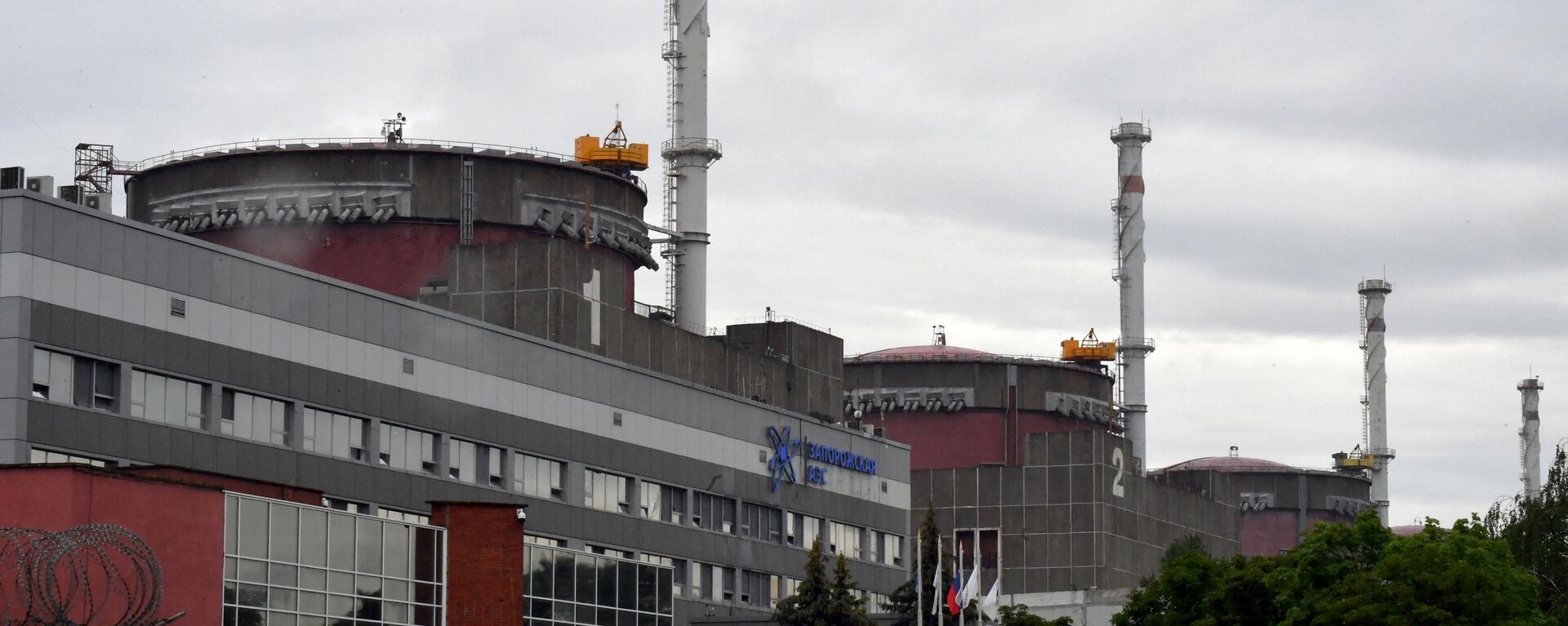 A photo shows a view of the Russian-controlled Zaporozhye nuclear power plant in southern Ukraine on June 14, 2023.  - Sputnik Africa, 1920, 09.04.2024