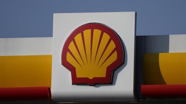 A Shell logo is seen at a petrol station in London, Tuesday, March 8, 2022. - Sputnik Africa