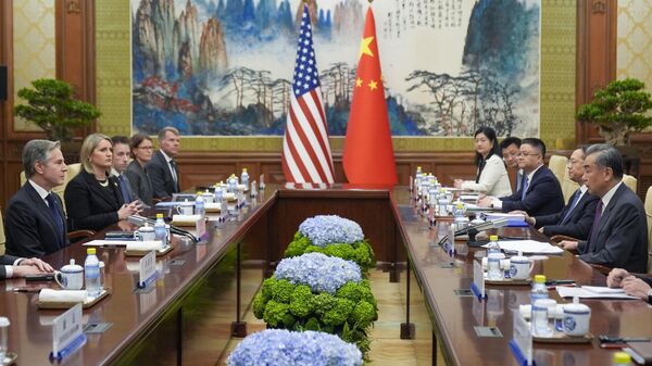 US Secretary of State Antony Blinken, left, talks to China's Foreign Minister Wang Yi, right, during their meeting at the Diaoyutai State Guesthouse, Friday, April 26, 2024, in Beijing, China. - Sputnik Africa