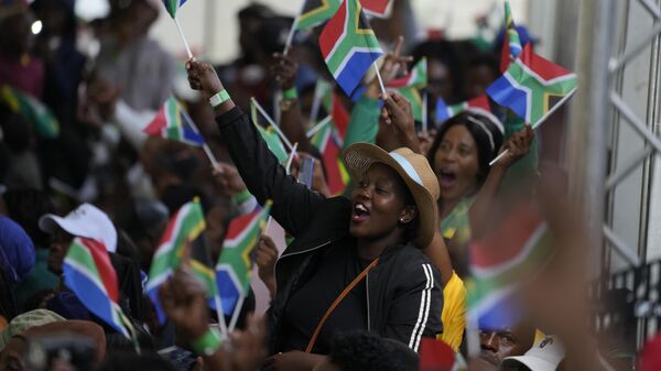 People attend Freedom Day celebrations in Pretoria, South Africa, Saturday April 27, 2024. The day marks April 27 when the country held pivotal first democratic election in 1994 that announced the official end of the racial segregation and oppression of apartheid.  - Sputnik Africa