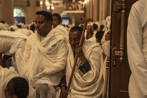 Ethiopian Orthodox devotees pray during the celebration of Easter at the Bole Medhanialem Church in Addis Ababa on May 5, 2024. Ethiopian Easter, also known as &#x27;Fasika&#x27; in Amharic, commemorates the resurrection of Jesus, and it comes after a 55-day period of Lent among faithful Orthodox believers. Orthodox Christians partake in the 55-day religious fasting, abstaining from eating meat and other animal products.  - Sputnik Africa