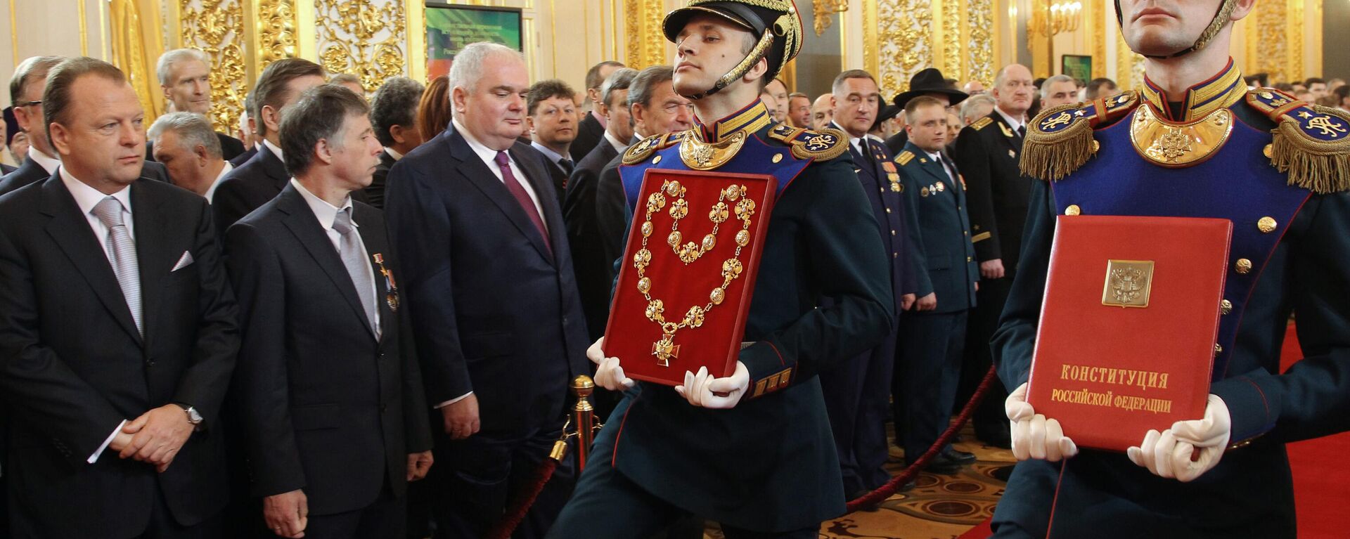May 7, 2012. The specially prepared copy of the official text of the Russian Constitution of 1993 as amended and the Badge of the Russian President consisting of the badge and the chain are being carried into St Andrew Hall of the Grand Kremlin Palace during the inauguration of President-elect Vladimir Putin. - Sputnik Africa, 1920, 06.05.2024