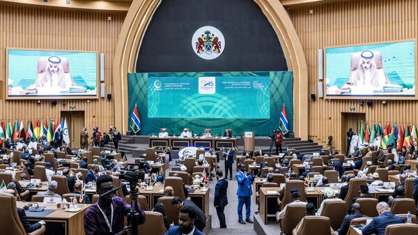 Delegates listen to speeches at the Sir Dawda Kairaba Jawara International Conference Center during the Organisation of Islamic Cooperation (OIC) 2024 Summit in Banjul on May 04, 2024. - Sputnik Africa