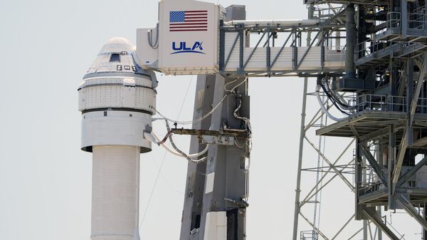 Boeing's Starliner capsule atop an Atlas V rocket is seen at Space Launch Complex 41 at the Cape Canaveral Space Force Station a day after its mission to the International Space Station was scrubbed because of an issue with a pressure regulation valve, Tuesday, May 7, 2024, in Cape Canaveral, Fla.  - Sputnik Africa