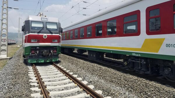 In this photo of Saturday, Sept.24, 2016, locomotives for the new Ethiopia to Djibouti electric railway system queue outside a train station in the outskirts of Addis Ababa.  - Sputnik Africa