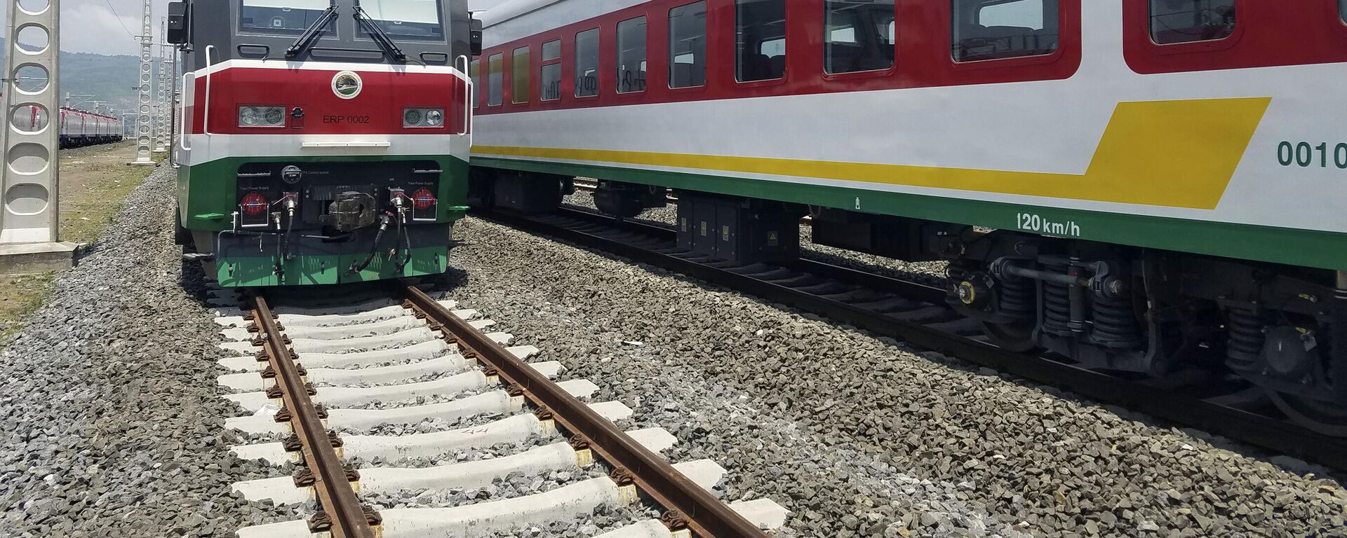 In this photo of Saturday, Sept.24, 2016, locomotives for the new Ethiopia to Djibouti electric railway system queue outside a train station in the outskirts of Addis Ababa.  - Sputnik Africa, 1920, 12.05.2024