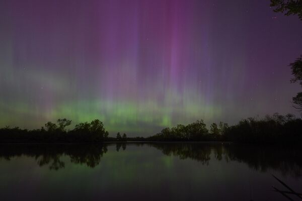 Northern lights or aurora borealis illuminate the night sky near London, Ontario, Canada. - Sputnik Africa