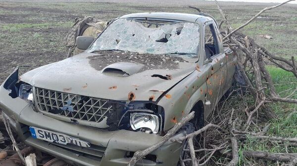 Véhicule avec une plaque d'immatriculation britannique détruit en république populaire de Donetsk - Sputnik Afrique