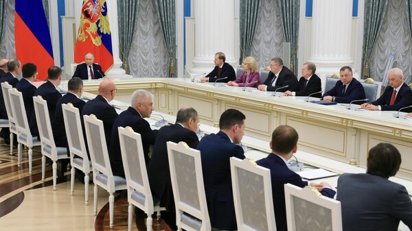 Russian President Vladimir Putin speaks during a meeting with members of the government after signing decrees on the composition of the new cabinet of ministers, at the Kremlin, in Moscow, Russia, on Tuesday, May 14, 2024. - Sputnik Africa