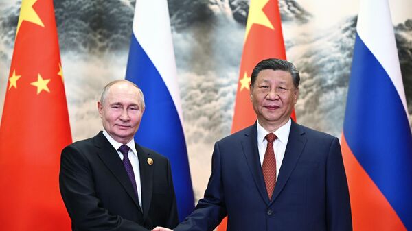 Vladimir Poutine s'entretient avec Xi Jinping, le 16 mai 2024 à Pèkin - Sputnik Afrique