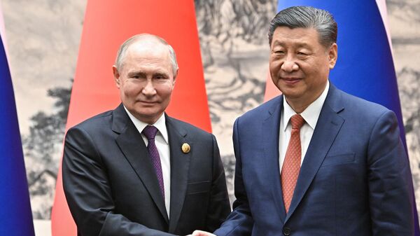 Vladimir Poutine et Xi Jinping à Pékin (archive photo) - Sputnik Afrique