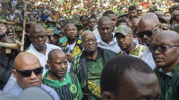 Former South African President Jacob Zuma, centre, arrives at Orlando stadium in the township of Soweto, Johannesburg, South Africa, for the launch of his newly formed uMkhonto weSizwe (MK) party's manifesto Saturday, May 18, 2024.  - Sputnik Africa