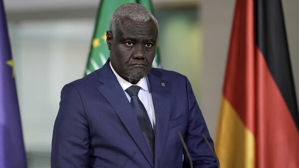 African Union chairperson Moussa Faki Mahamat attends a news conference during the G20 Investment Summit - German Business and the CwA Countries on the sidelines of a Compact with Africa in Berlin, Germany, Monday, Nov. 20, 2023. - Sputnik Africa