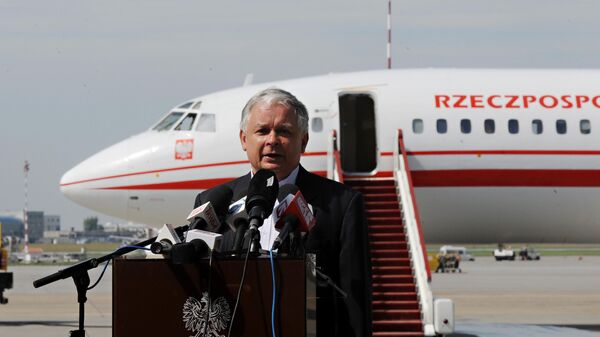 Polish President Lech Kaczynski speaks to the press prior to boarding his plane at the military airport in Warsaw, Poland. - Sputnik Africa