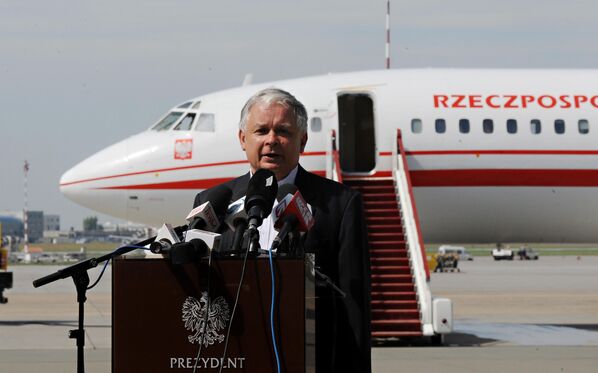 Polish President Lech Kaczynski (1949–2010) speaks to the press prior to boarding his plane at the military airport in Warsaw, Poland. The plane crashed while approaching Smolensk Air Base in Russia. - Sputnik Africa