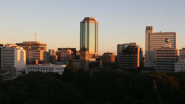 Day breaks over the Zimbabwean Reserve Bank, center, and the capital Harare, Friday, April 4,2008. - Sputnik Africa
