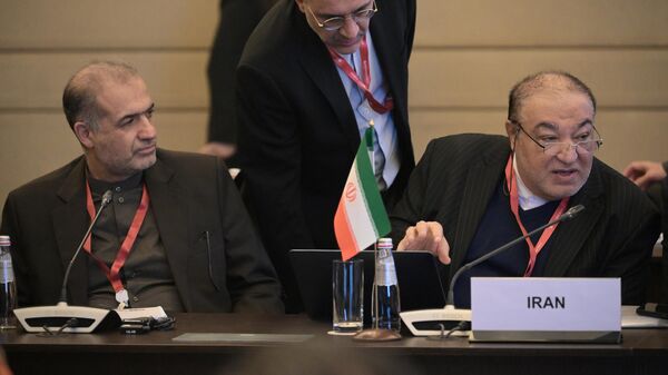 Iranian Deputy Foreign Minister Mehdi Safari, right, attends a meeting of sherpas and sous-sherpas of the BRICS countries in Moscow, Russia, on January 31, 2024.  - Sputnik Africa