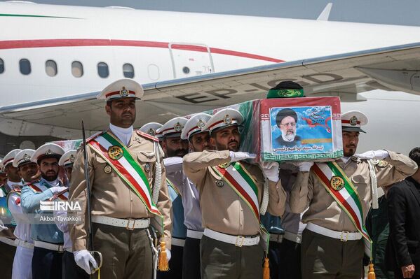 Arrival of the body of Ebrahim Raisi at Mashhad airport - Sputnik Africa